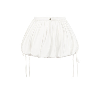 White pleated skirt on a white background