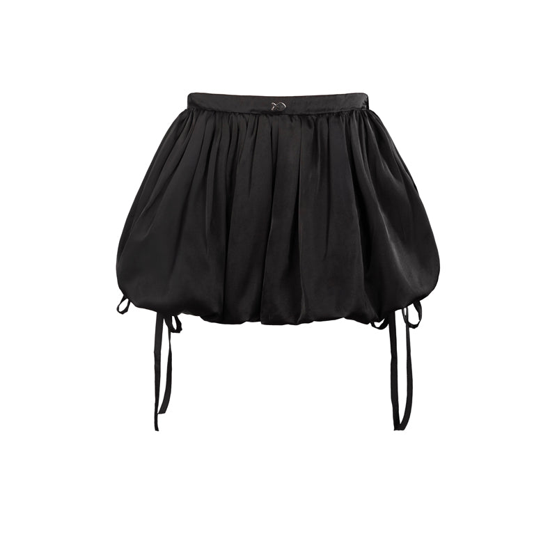 Black balloon skirt with thin straps on a white background