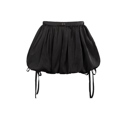 Black balloon skirt with thin straps on a white background