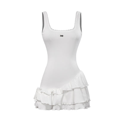 White dress with ruffled skirt on a white background
