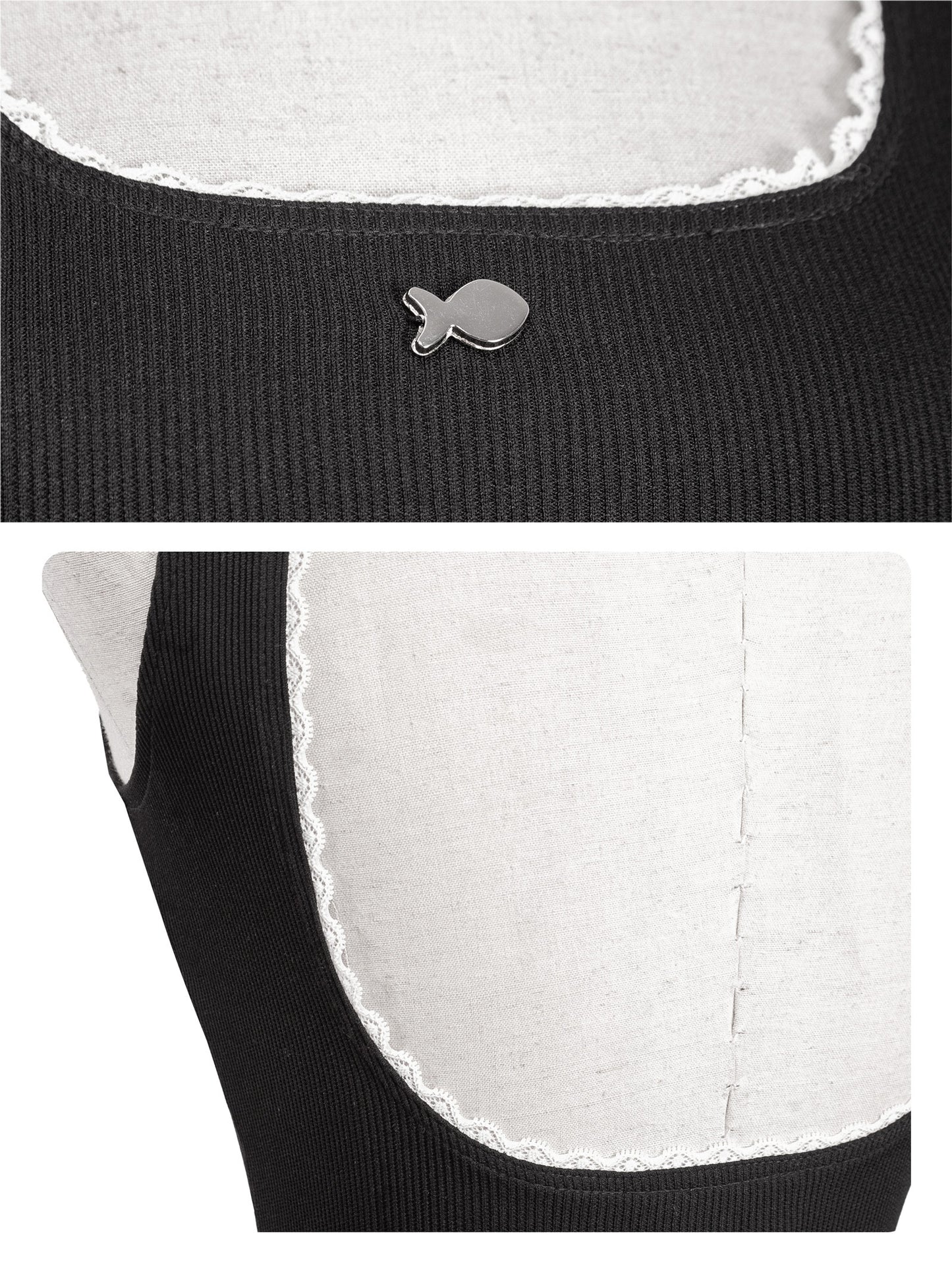Close-up of a black garment with white lace trim and a small fish-shaped button.