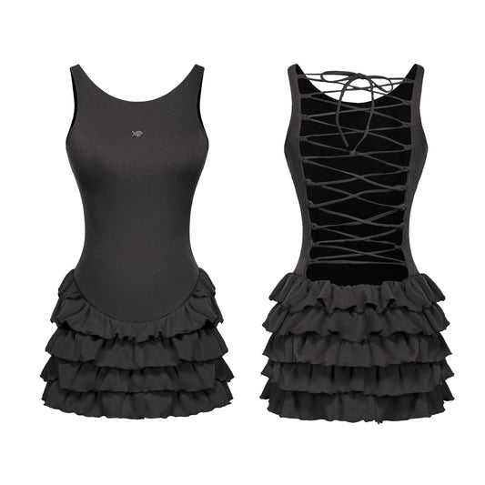 Two black dance costumes with ruffled skirts on a white background