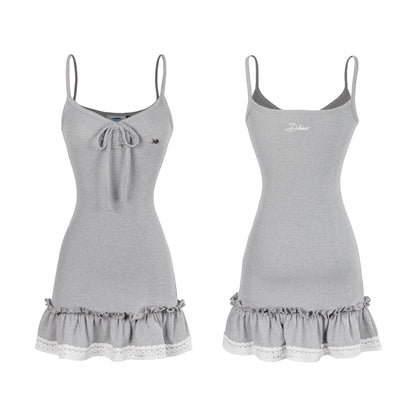 Two gray nightgowns with lace trim on a white background