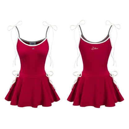 Red dress with white straps on a white background