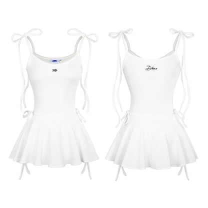 Two white sleeveless dresses with thin straps on a white background