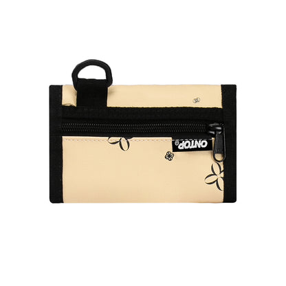 Beige wallet with black trim and floral design on a white background