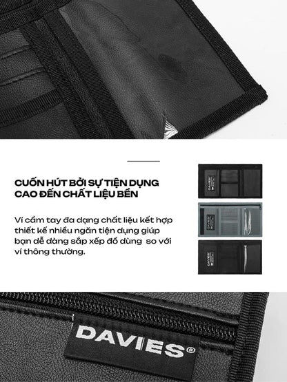Black pouch with multiple compartments and a visible 'Davies' brand label on a white background.