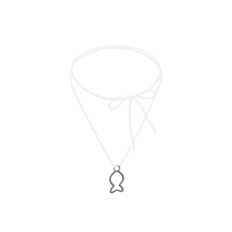Silver fish-shaped pendant on a white background