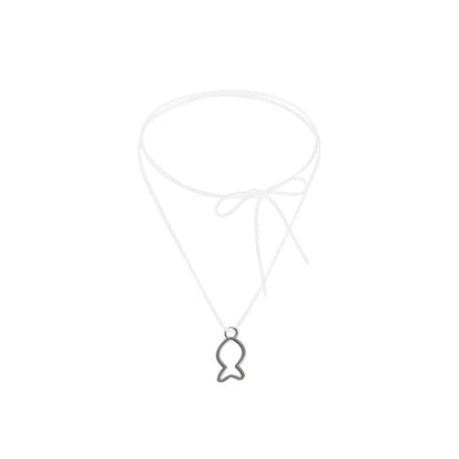 Silver fish-shaped pendant on a white background
